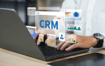 Businessman using a computer and dashboard CRM for Management Customer Relationship Management for business sales marketing system concept.CRM database analysis on Internet Technology